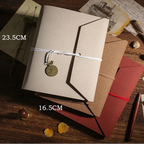 Two envelopes on a wooden surface with measurements indicated